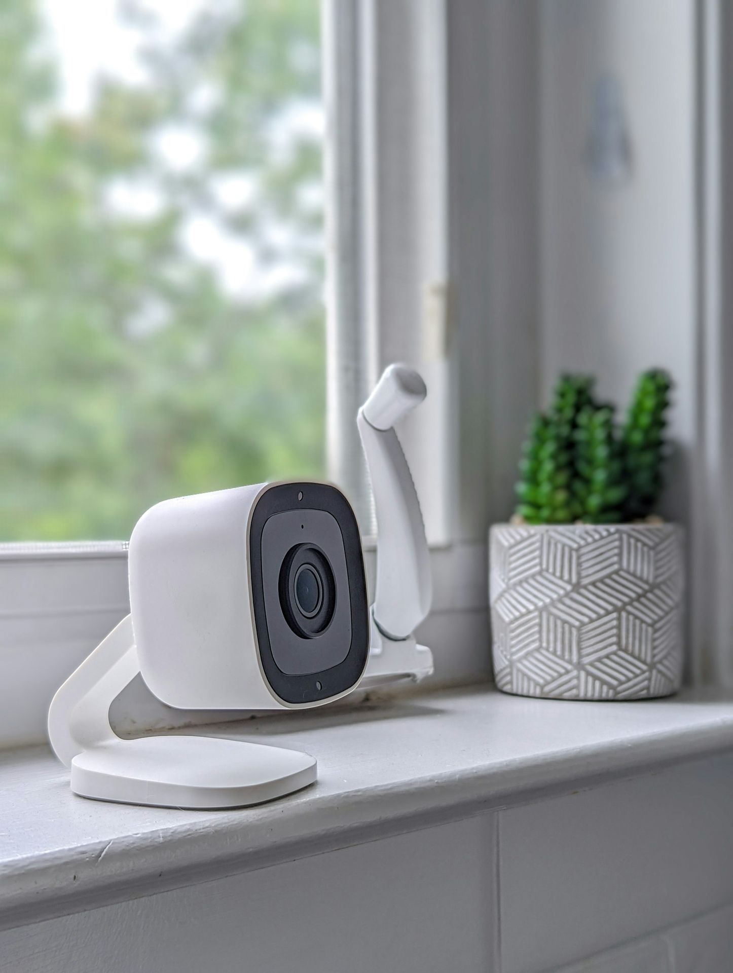 a white toaster on a counter